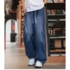 Pantalones de Mezclilla Negros Fluidos para Hombre, Pantalones Casuales de Moda Estilo Americano High Street con Cordón y Cintura Elástica, Pantalones Largos Ligeramente Acampanados para Pareja
