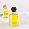 Suministro directo al por mayor botella de perfume 30ml50ml100ml botella de vidrio para perfume botella secundaria botella con atomizador botella de perfume cilíndrica