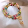 Pulsera de Turmalina Colorida de Doble Capa Colgante de Cristal de Té Cristal Fresa Candado de la Riqueza Elegante Celebridad Cibernética Elegante Elegante Pulsera de Cuerda Sangrante para Mujer