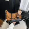 Bolsas Retrô de Nicho Transfronteiriças Femininas 2026 Novo Estilo Padrão Diamante Versátil Bolsa Transversal Cor de Moda Blocos de Cor Bolsa de Ombro Único Sob o Braço