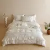 Conjunto de quatro peças bordado em algodão de fibra longa 100S, romântico e elegante, estilo francês, com fronhas de renda e lençol, adequado para todas as estações