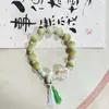 Fabricantes suministro pulsera de cachorros de cerámica diseño de nicho pulsera nuevo chino lindo cachorros huesos cuentas juguetonas