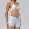 Conjunto de yoga ecológico de poliéster spandex reciclado com gola halter para mulheres, shorts de cintura alta com patchwork, conjunto esportivo de duas peças justo para fitness em estoque