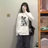 Camiseta de manga larga de algodón puro estilo retro americano para mujer, nuevo diseño 2025, marca de nicho de moda, top holgado con estampado de dibujos animados para adelgazar