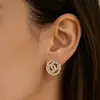 Estilo Coreano Versión Coreana Letra Doble Círculo Sentido de Diseño de Nicho Pendientes de Lujo Ligero Huecos Sentido de Alta Gama Pendientes de Botón Accesorios Venta al por Mayor Transfronteriza