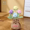Planta de rosa artificial tejida en maceta, producto terminado hecho a mano a crochet, flor artificial para decoración de escritorio en casa, venta al por mayor de regalos, flor de hilo