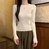 Camiseta básica de punto de color liso, modelo nuevo 2024 para mujer, adecuada para primavera y otoño, cuello redondo, manga larga, top corto, se puede usar debajo de un blazer o como suéter en invierno