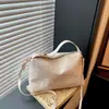 Bolso casual personalizado a la moda y moderno, bolso de hombro y bandolera de nicho para mujer, nuevo bolso tipo cubo texturizado verano 2026