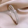 Pulsera Redonda Entrelazada Hueca Transfronteriza Europea y Americana, Pulsera de Declaración Moderna y Única, Joyería de Lujo Ligero de Gama Alta para Mujeres