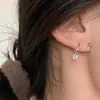 Vento frio moda compacta linha estrela pingente estrela brincos espirais design requintado Joker joia de ouvido feminina atacado