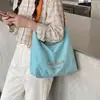 2026 Bolsa Tote Versátil Ombro Único Estudante Feminina Leve Grande Capacidade Casual Verão Bolsa de Mão Nova Bolsa de Lona