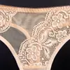 Ropa interior transparente para mujer mostrando lana y exponiendo sexy encaje de malla de tiro bajo sin costuras calzones tanga para mujer