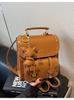 Mochila Transfronteriza Estilo Retro Occidental 2025 Nueva Moda Casual Portátil Estilo Coreano Mochila Retro