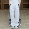 Ropa Infantil Estilo Coreano Colección Verano 2025: Conjunto de Camiseta de Manga Corta con Estampado de Letras para Niños y Pantalones Deportivos Anchos con Cordón y Lazo para Niñas