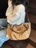 Bolsa Portátil Transfronteiriça de Grande Capacidade para Mulheres 2025 Novo Design de Nicho Bolsa Tote Simples Tendência Bolsa Transversal