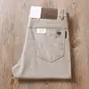 Estación Europea 2024 Verano nuevo gris oscuro sarga elástica para hombre Transpirable Cintura alta de negocios rectos casuales pantalones