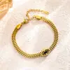 Estilo Nuevo Europeo y Americano Joyería Acero de Titanio Acero Inoxidable Oro Ojo del Diablo Pulsera Pulsera Ojo Joyería de la Suerte para Hombres y Mujeres