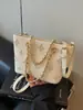 Bolso de Mano Pequeño Elegante de Alta Gama Transfronterizo para Mujer 2026 Nueva Moda Bolso Cruzado Versátil Bolso Cubo de Moda Veraniega
