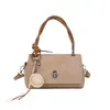 Bolso de hombro retro moderno para mujer Yuezizi 2026 nueva versión coreana bolso de mano tejido simple bolso cruzado versátil de moda