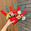 Anillo de resorte navideño Accesorios para el cabello festivos Muñecos de dibujos animados Pequeños regalos para niños Pulseras para parejas Artículos decorativos Árbol de Navidad