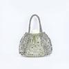 Bolsa de mão personalizada, moderna, com recorte retrô de metal, tecida à mão, com design de nicho, bolsa feminina com lantejoulas e glitter