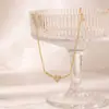 Colar de aço inoxidável com padrão de coração de luxo e design de strass para mulheres, joia versátil única e de alta qualidade para atacado