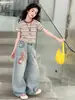 Conjunto de Niña Verano 2026 Nuevo Estilo Camiseta Rayada de Manga Corta para Niños Conjunto Estilo Coreano Pantalones de Mezclilla para Niños Grandes Conjunto de Dos Piezas