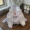 Mochila fofa com orelhas de coelho transfronteiriça, estilo college doce, grande capacidade, mochila casual versátil para o dia a dia para mulheres