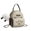 Bolsa de maternidad estilo 2026, mochila de moda para mujer estilo Melard, moderna y versátil