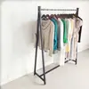 Estantería Central de Isla Minimalista para Tienda de Ropa Estante Central Doble Fila para Hombre y Mujer Estante de Piso con Barra Doble para Colgar Ropa