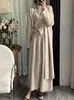 Conjunto de Tres Piezas de Punto de Longitud Media Estilo Coreano Otoño e Invierno Suéter de Cuello Alto de Alta Gama Cardigan Falda Traje Transfronterizo para Mujer