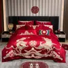 Lujoso juego de cuatro piezas de color rojo brillante para boda, algodón puro con bordado de dragón y fénix, sábana bajera y funda de edredón, ropa de cama para boda