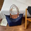 Bolsa de Ombro Transfronteiriça Dragon Bags Xiang Bag Moda Grande Capacidade Bolsa Tote Comércio Exterior Cor Color Blocking Estilosa Versátil Casual Simples