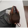 Bolsa Saco com Padrão Lichia para Mulheres 2026 Inverno Nova Casual Versátil Bolsa de Mão Bolsa de Ombro Fashionável para o Dia a Dia Bolsa Transversal