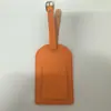 Etiqueta de equipaje para pase de abordar de cuero PU multicolor engrosado portátil, se puede personalizar el logotipo, fila anti-pérdida de viaje