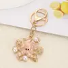 Estilo Oceano Criativo Polvo Pingente de Metal Chaveiro de Carro Pingente de Mochila Pequenos Presentes Exquisitos Cravejados de Diamante Venda por Atacado