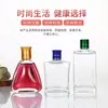 Venta al por mayor de fábrica botella de vino de vidrio de 125 ml transparente engrosada botella de vino pequeña creativa botella de vino vacía tapón de plástico sellado