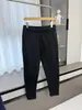 ¡Estilo de pierna cónica! ¡Tejido Toray de capa de aire! Moda masculina otoño e invierno color liso cremallera versátil hoja curva pantalones casuales