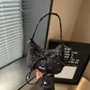 Bolsa Pequena de Mão Elegante com Laço Feminina 2026 Estilo Coreano Nicho Bolsa de Mão Nuvem Bolsa de Ombro Único Transversal Fashion