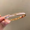 Pulsera de acero de titanio transfronteriza, anillo abierto liso de lujo discreto, apilable versátil, joyería que no se decolora de la fábrica de origen