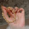 Pulsera de Invierno de Moda de Lujo Ligero con Ojo de Gato de Copo de Nieve de Iris Nuevo Sentido Chino de Alta Gama Exquisita Pulsera de Diamante de Iris para Mujer