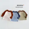 Camiseta térmica base para niños 2026 otoño e invierno color de dibujos animados bloques de color interior engrosado para bebés niños zdy6564