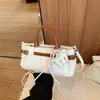 Bolsos de Lujo de Nicho para Mujer 2026 Nuevo Retro Versátil Bolso de Hombro Cruzado de Moda Chic Bolso de Mano para el Trabajo