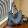 Nuevo bolso de hombro de mezclilla de gran capacidad transfronterizo 2026, bolso casual de moda vintage para el día a día, bolso tipo tote a la moda