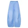 Pantalones de chándal holgados de pierna ancha en azul lavado con adornos de remaches verticales en ambos lados, bordado de estrella de cinco puntas y puños ajustables con cordón, unisex
