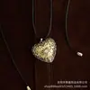 Novo Colar Artístico Retro Estilo Chinês com Design de Casca de Fruta, Corrente Longa Ajustável para Suéter com Temperamento de Nicho de Planta Fruta