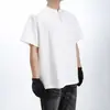 Camiseta de manga corta para hombre, estilo americano, media cremallera, resistente, marca de moda de verano, diseño elegante, corte limpio, manga corta holgada