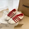 Zapatillas de entrenamiento alemanas retro de rayas con velcro para mujer, nuevas súper populares versátiles de otoño 2026, zapatillas casuales estilo Forrest Gump