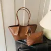 Bolso Tote Retro Versátil de Hombro para Otoño para Mujer 2025 Nueva Moda Alemana de Gama Alta para el Trabajo Bolso de Axila para el Viaje Diario