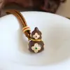 Retro Exquisito Circón Micro-Pavimentado Gota de Aceite Calabaza Trébol de Cuatro Hojas Accesorios para Collar Mujer Lujo Accesible Nicho Cadena de Suéter de Gama Alta